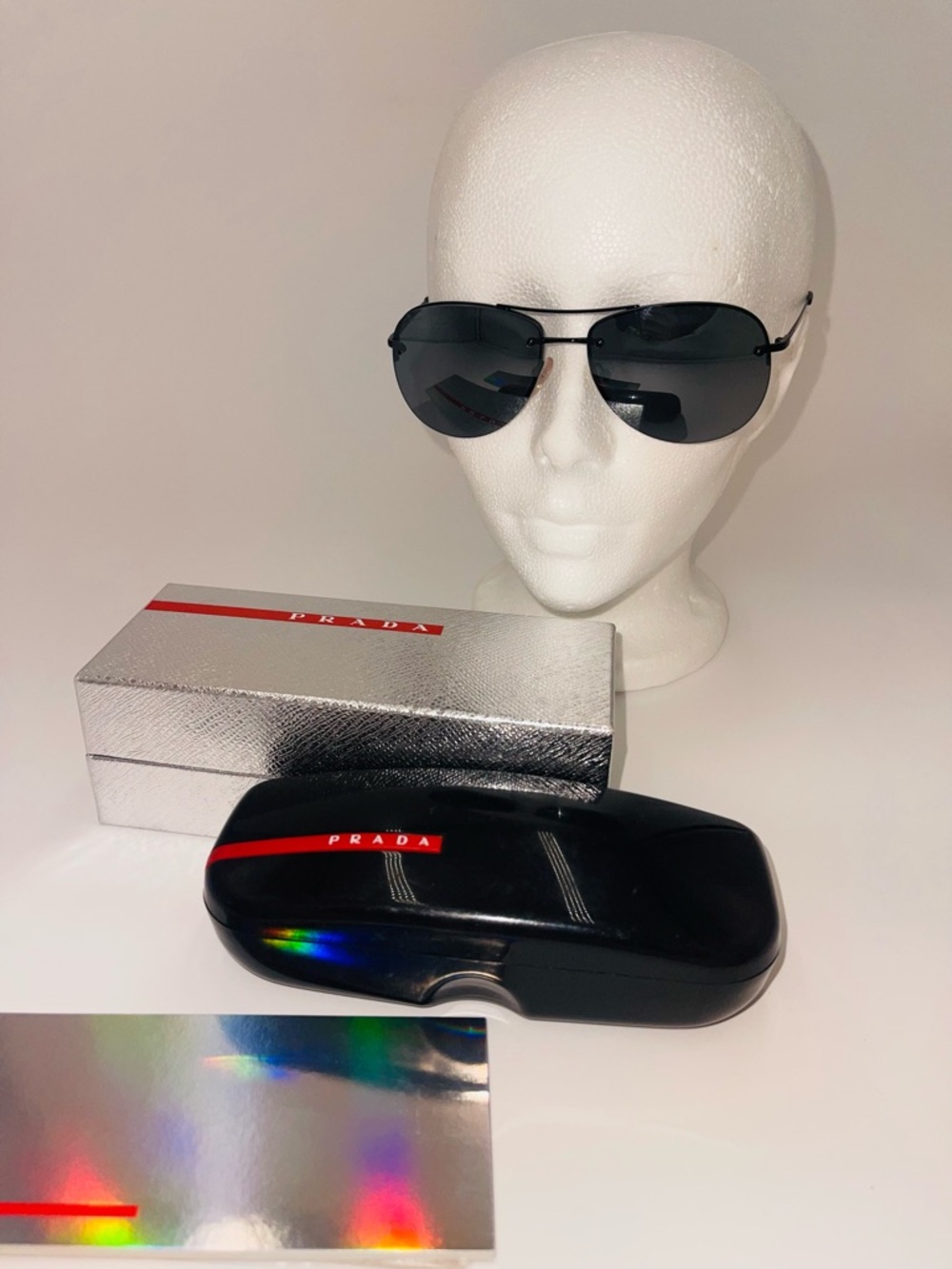 Prada Black Aviator Sunglasses with Red Accented Case